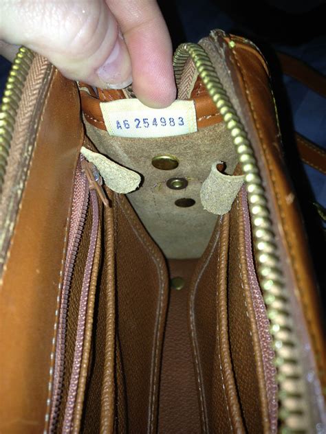 are so many purse bloggers) will tell you to find first: sewn-in tags and serial numbers. . Dooney and bourke purse serial number lookup